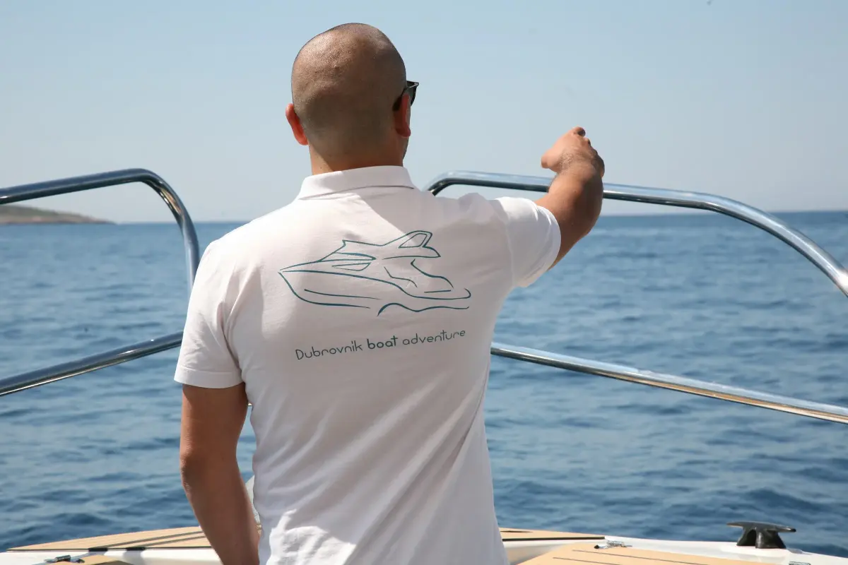 Skipper pointing out the route from the bow