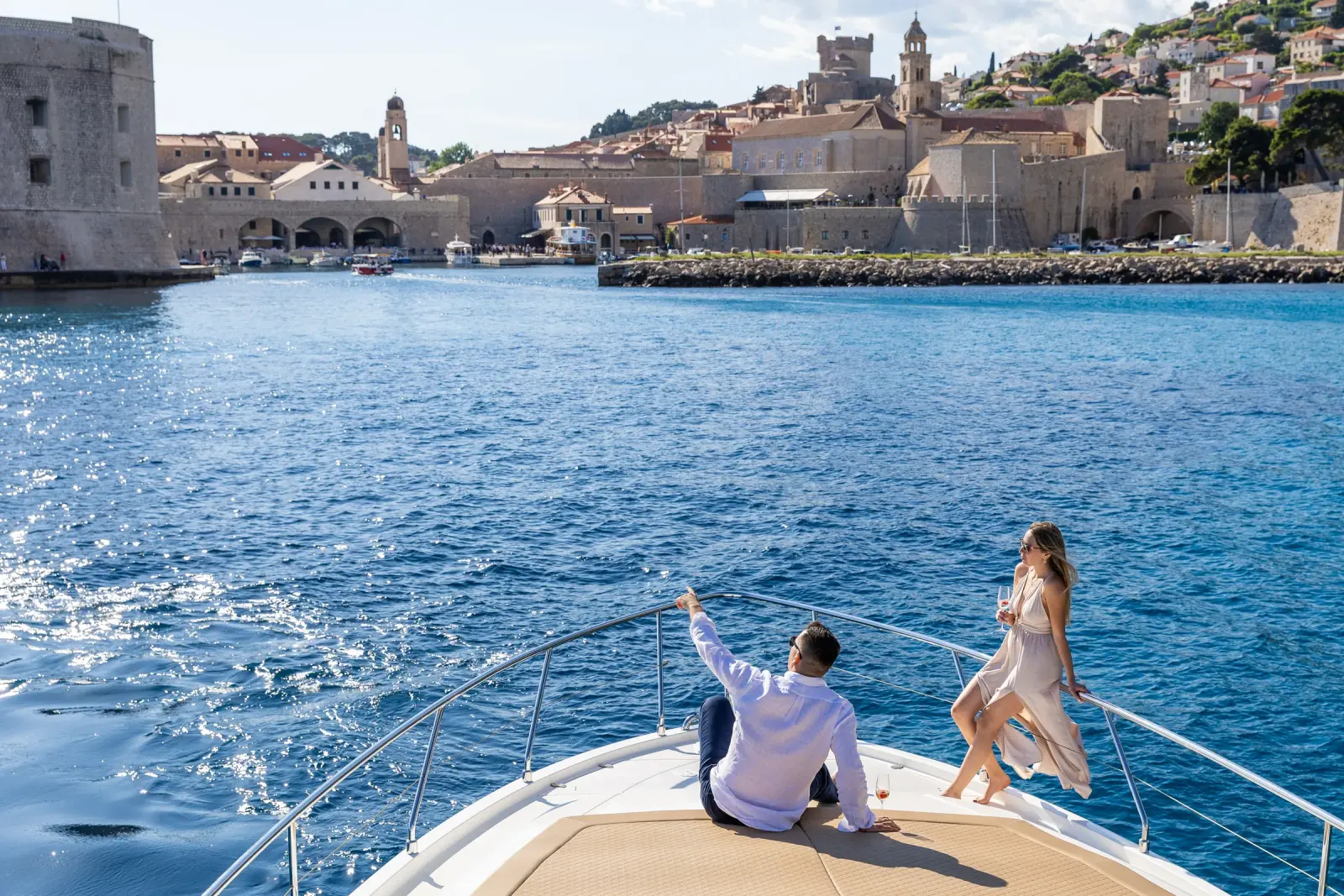 Couple on the bow approaching Dubrovnik's Old Port