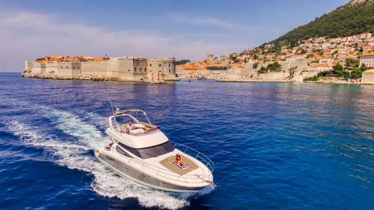 Jeanneau Prestige 440 Amica cruising towards Dubrovnik Old Town