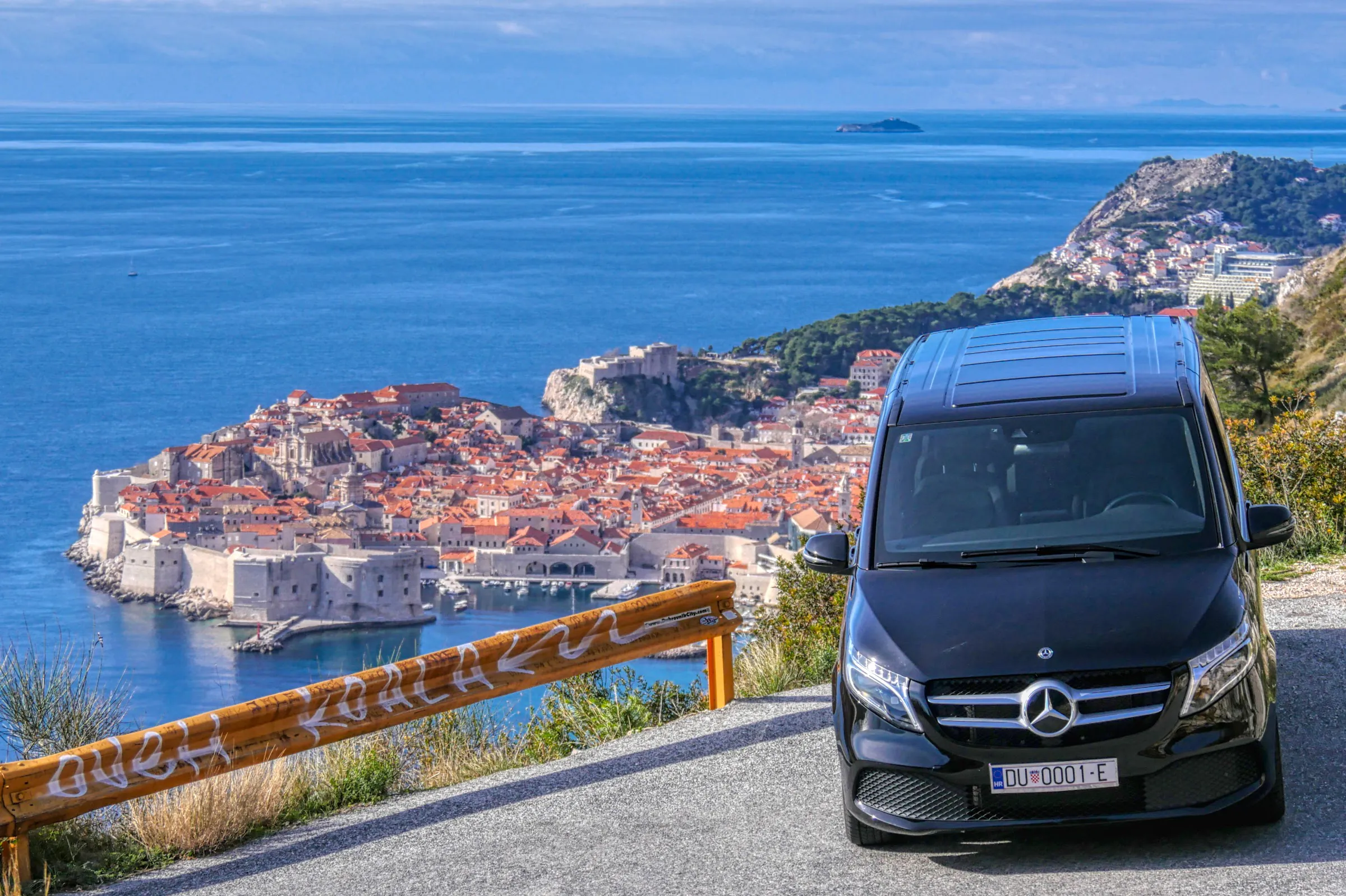 Black Mercedes van at a viewpoint above Dubrovnik Old Town