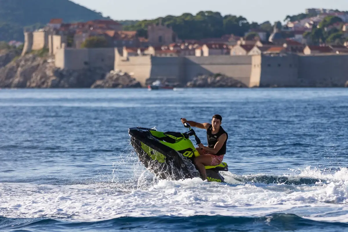 Jet ski rider in front of Dubrovnik's city walls