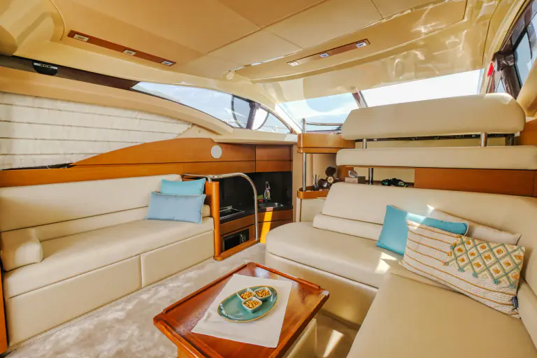 Salon of the Azimut 43 Fly with sofa and coffee table